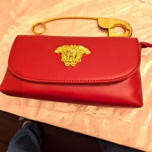 Rare red faux leather Medusa head safety pin handle bag